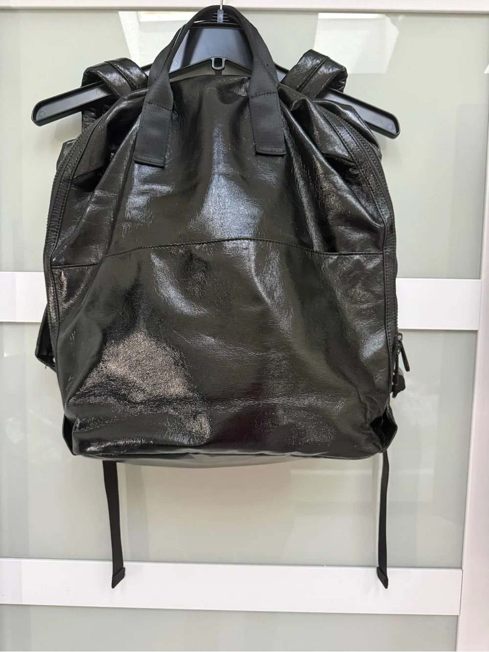 Sleek Shiny Black Leather Backpack